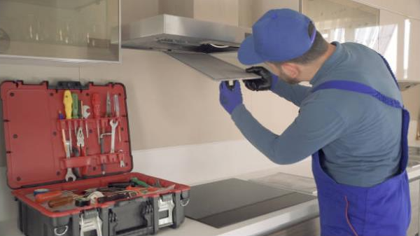 technician fixing the air vent