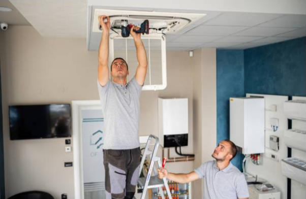 Technician fixing the air vent